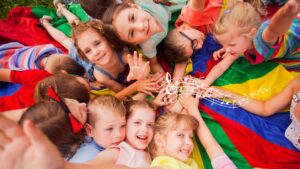 Kids enjoying summer piano camp at EKS Music School